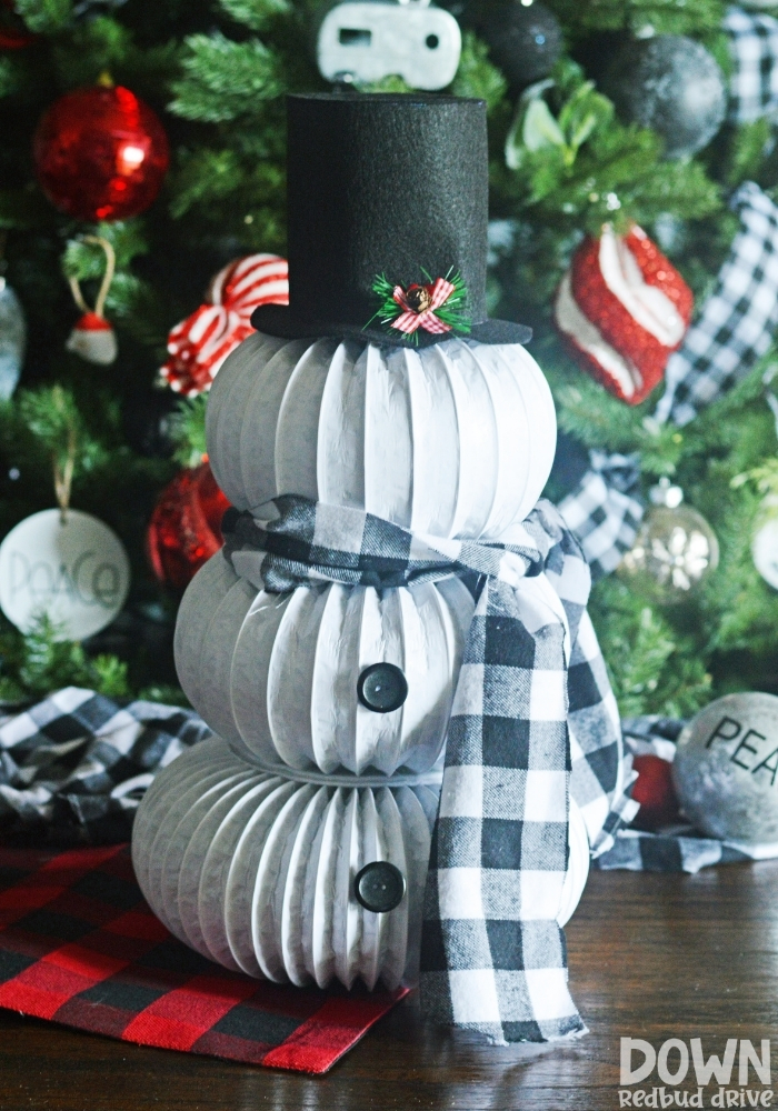diy-dryer-vent-snowman-main-tall DIY Dryer Vent Snowman main tall image in front of a decorated Christmas tree.