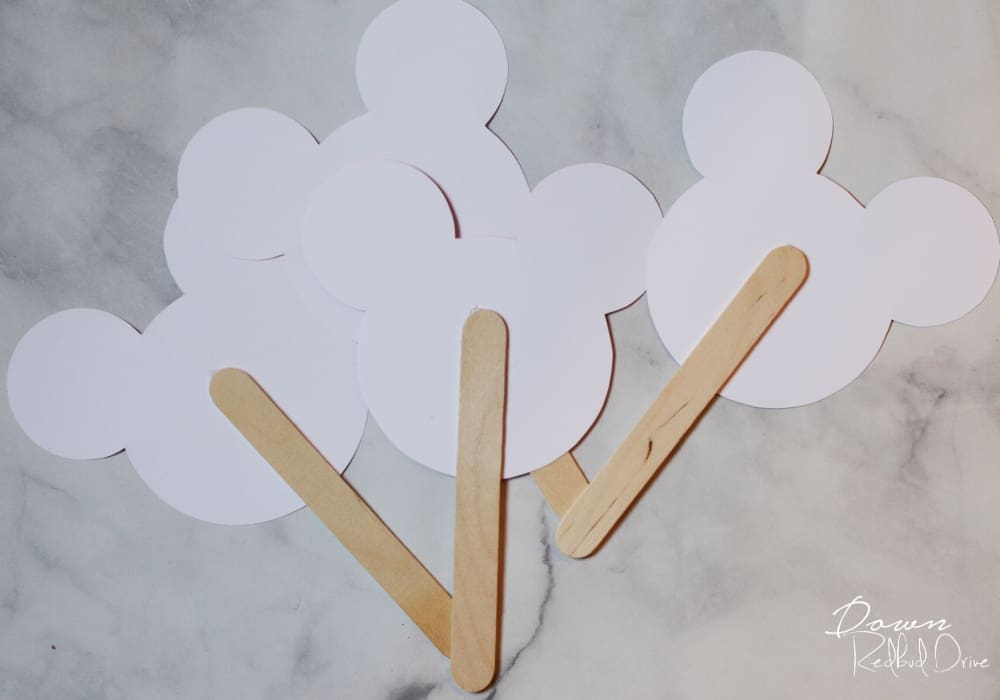 mickey-valentine-pops-3 popsicle sticks glued to paper mickey heads