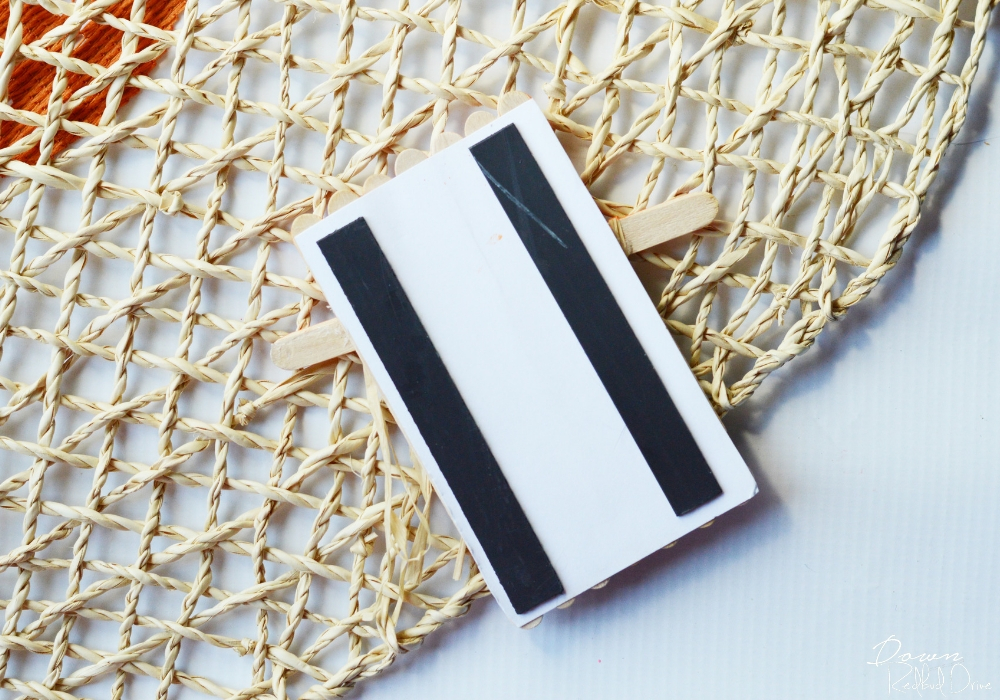 popsicle-stick-scarecrow-3 magnet strips glued onto popsicle sticks