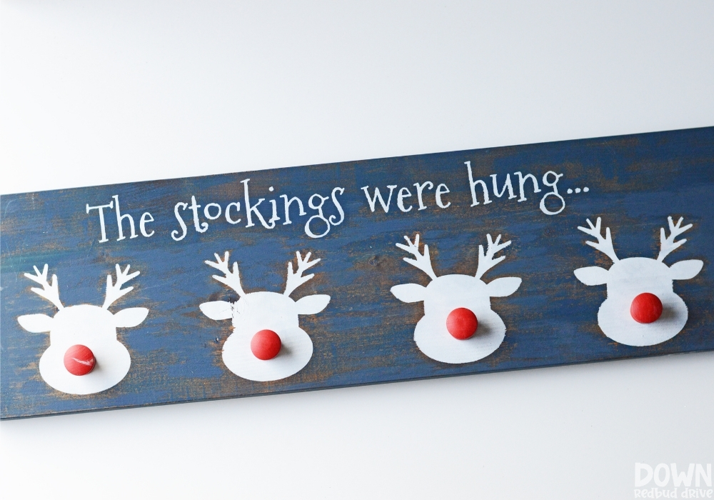 reindeer-stocking-holder-diy-wide-6 The finished reindeer stocking holder DIY on a white background.