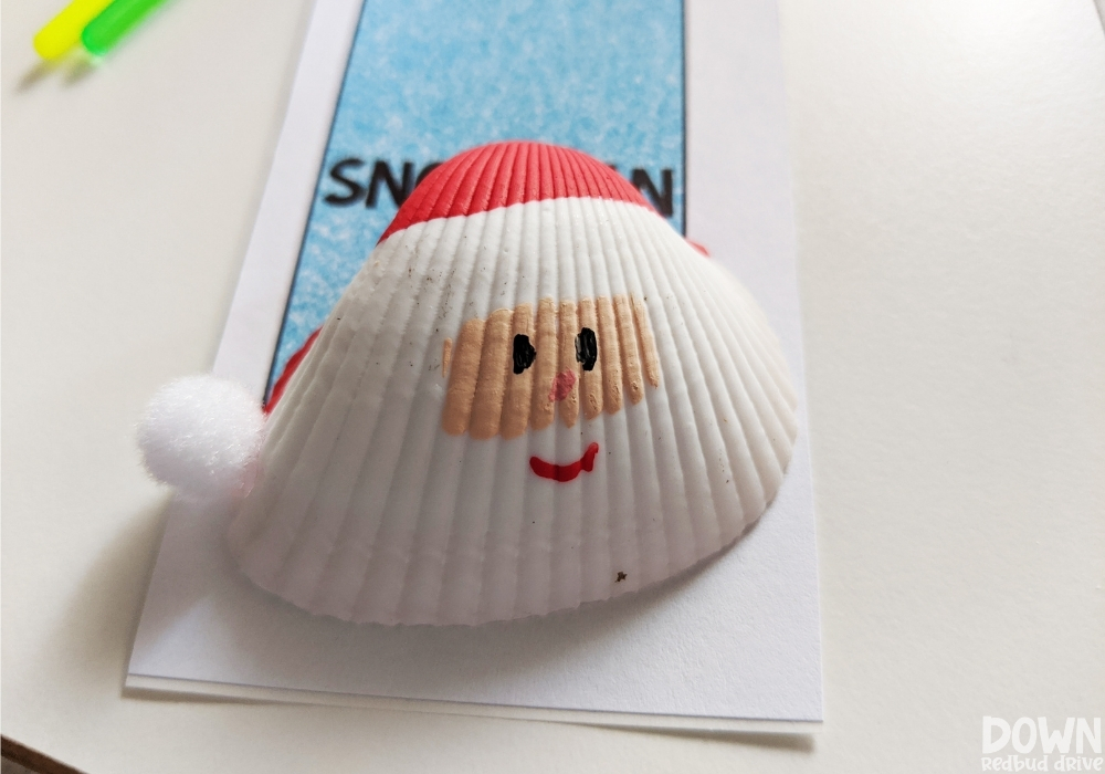 santa-seashell-ornament-diy-wide-4 Overhead picture of the finished Santa Seashell Ornament.
