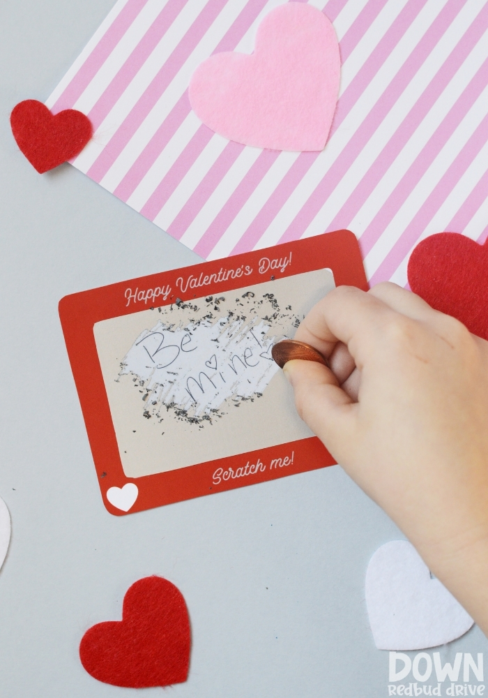 scratch-off-valentines-main-tall A tall closeup of a Scratch Off Valentine that says "Be mine!"