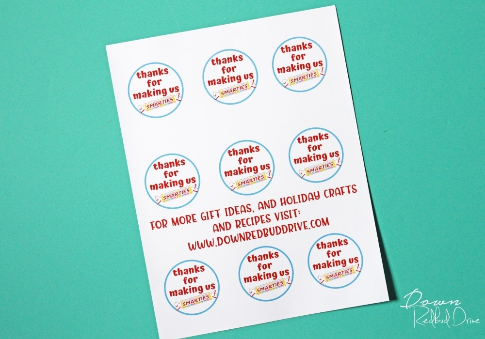 smarties-teacher-gift-wide-1 Overhead shot of uncut "thanks for making us smarties" printable gift tags.
